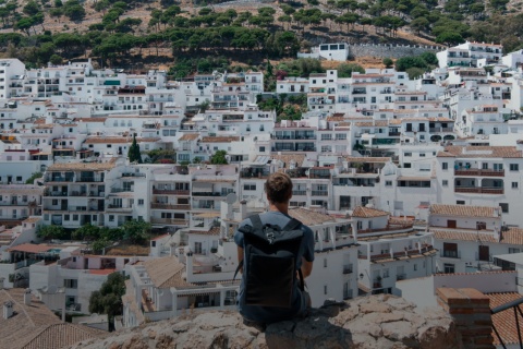 Tourist enjoying the views of the town of Mijas in Malaga, Andalusia