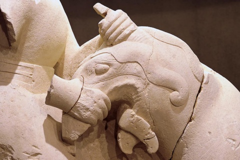 Detail of the sculpture griphomaquia depicting a man fighting a griffin. 5th century