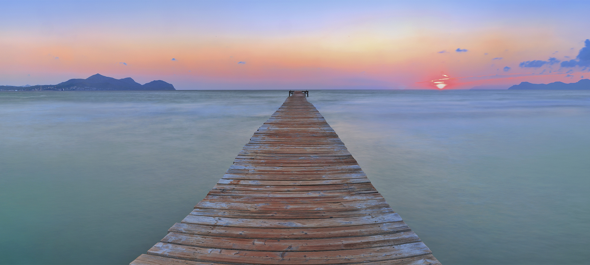 Jetty on the beach in Muro (Mallorca, Balearic Islands) Jetty on the beach in Muro (Mallorca, Balearic Islands)