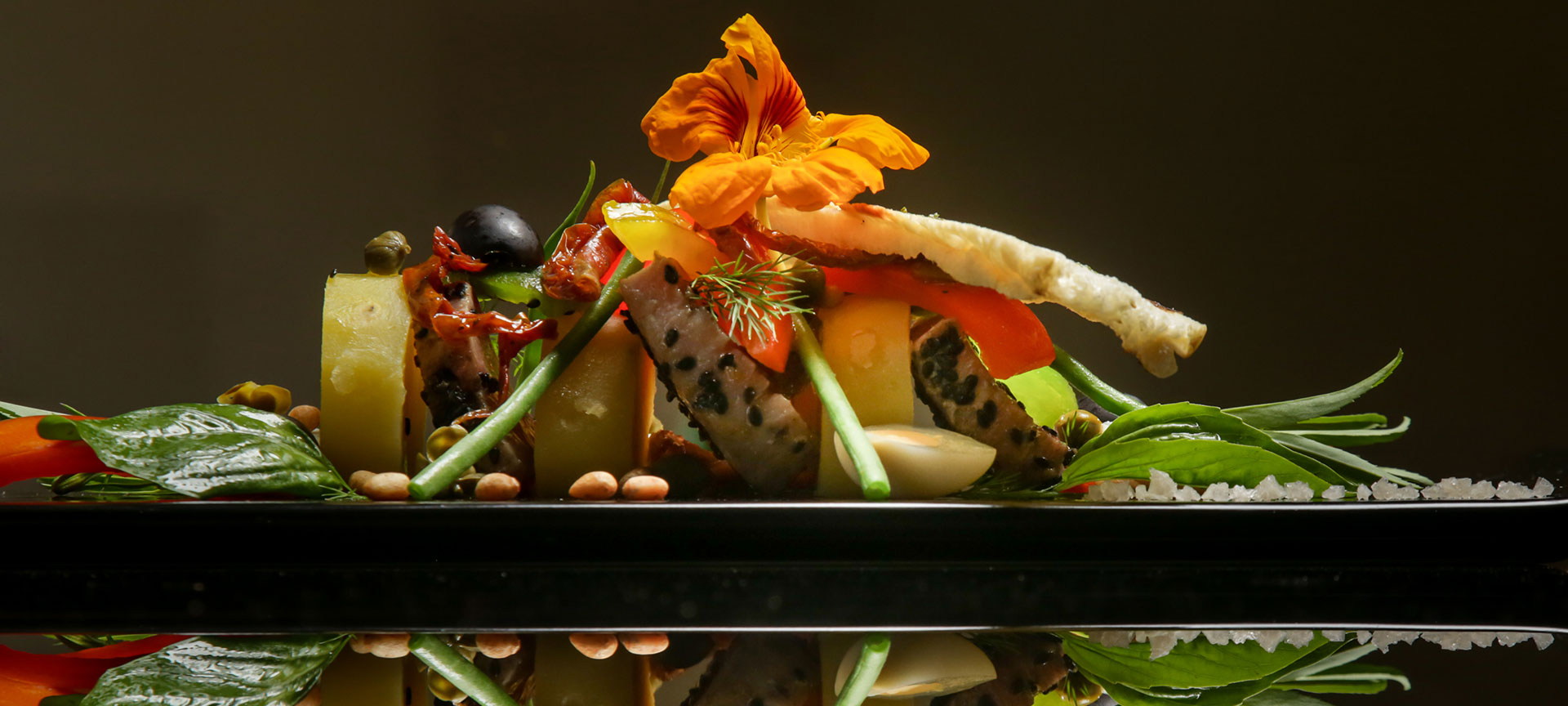 Black sesame tuna with potato, vegetables and tomato confit Black sesame tuna with potato, vegetables and tomato confit