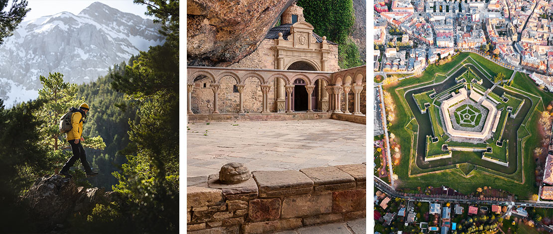 Senderistas en pueblo de arquitectura popular en Aragón, en Hecho Senderistas en pueblo de arquitectura popular en Aragón, en Hecho